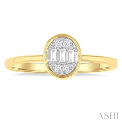 1/6 ctw Petite Bezel Set Oval Shape Fusion Baguette and Round Cut Diamond Fashion Ring in 10K Yellow Gold