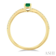 5x3 MM Emerald Shape Emerald and 1/10 ctw Petite Round Cut Diamond Precious Fashion Ring in 10K Yellow Gold