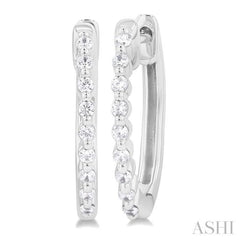 1/6 ctw Petite Shared Prong Round Cut Diamond Hoop Earring in Sterling Silver