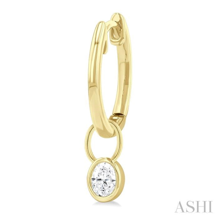 1/3 ctw Bezel Set Oval Cut Diamond Huggie Earrings in 14K Yellow Gold
