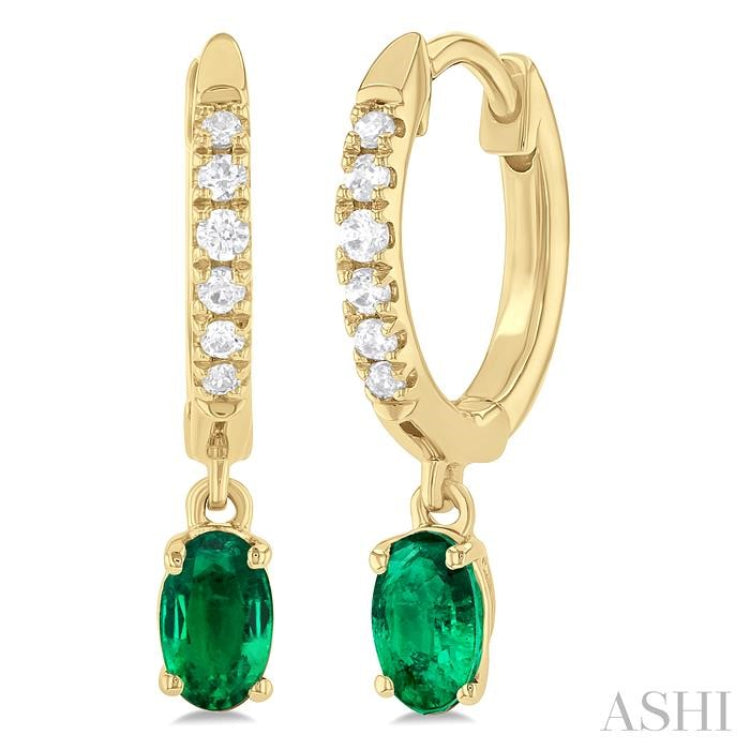 5x3 MM Oval Cut Emerald and 1/8 ctw Petite Round Cut Diamond Precious Fashion Huggies in 10K Yellow Gold