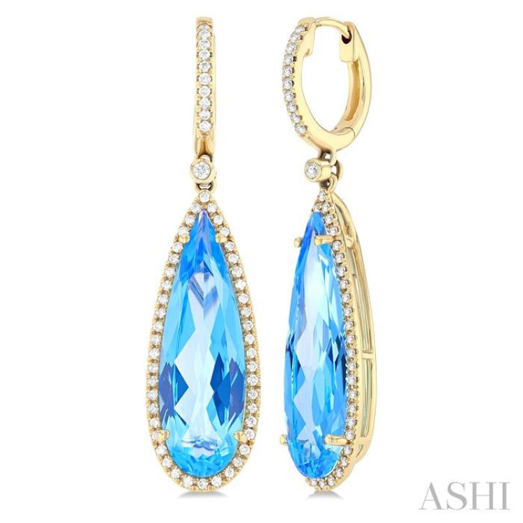 23x7 MM Pear Shape Blue Topaz and 3/8 ctw Round Cut Diamond Halo Semi Precious Earrings in 14K Yellow Gold